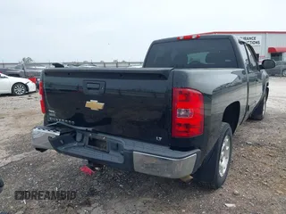 2011 Chevrolet Silverado 1500 LT with VIN 1GCRCSE0XBZ423010, listed as a IAAI auction lot 42112256 with 143,682 mi miles and . Bid and sale history available at DreamBid. Image 4.