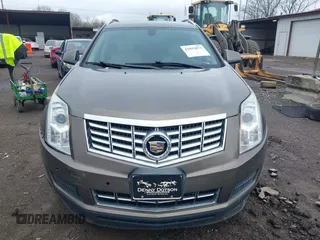 2015 Cadillac SRX Luxury Collection with VIN 3GYFNBE34FS521518, listed as a IAAI auction lot 41893073 with 82,700 mi miles and . Bid and sale history available at carsss.com. Image 12.