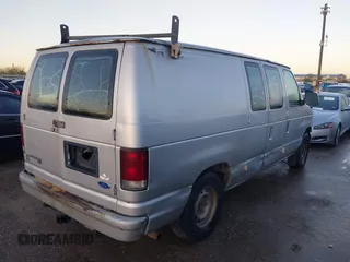 1996 Ford Econoline Cargo with VIN 1FTEE14Y7THB43210, listed as a IAAI auction lot 41862907 with Not Provided miles and . Bid and sale history available at DreamBid. Image 4.