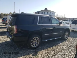 2015 GMC Yukon Denali z VIN 1GKS2CKJ1FR213798, wystawiony jako Copart lot #48545475 z przebiegiem Nie podano mil oraz Czysty tytuł • Clean title. Historia ofert i sprzedaży dostępna na DreamBid. Obrazek 3.