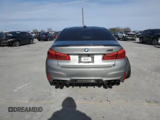 2019 BMW M5 Competition z VIN WBSJF0C54KB284808, wystawiony jako Copart lot #71974952 z przebiegiem 26 888 mil mil oraz . Historia ofert i sprzedaży dostępna na DreamBid. Obrazek 6.