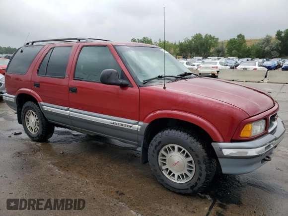 1997 GMC Jimmy SLS with VIN 1GKDT13W8V2515536, listed as a Copart auction lot 66701094 with 123,051 mi miles and Salvage Title. Bid and sale history available at carsss.com. Image 4.