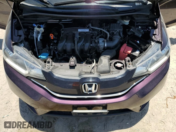 2015 Honda Fit EX z VIN 3HGGK5G82FM745065, wystawiony jako Copart lot #58358525 z przebiegiem 104 769 mil mil oraz Szkoda całkowita • Salvage title. Historia ofert i sprzedaży dostępna na DreamBid. Obrazek 12.