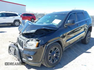 2013 Jeep Grand Cherokee Laredo with VIN 1C4RJFAG2DC643926, listed as a IAAI auction lot 41723575 with 125,048 mi miles. Bid and sale history available at carsss.com. Image 17.