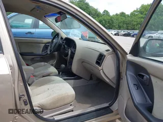 2003 Hyundai Elantra GLS z VIN KMHDN45D73U556305, wystawiony jako IAAI lot #42478211 z przebiegiem 149 648 mil mil oraz . Historia ofert i sprzedaży dostępna na DreamBid. Obrazek 5.
