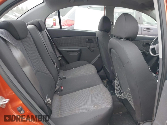 2009 Kia Rio LX with VIN KNADE223096543331, listed as a IAAI auction lot 41978544 with 166,749 mi miles and . Bid and sale history available at DreamBid. Image 8.