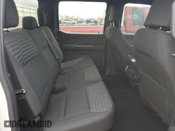 2023 Ford F-150 XL with VIN 1FTEW1CP2PFC13963, listed as a Copart auction lot 56045545 with 26,619 mi miles and Salvage title. Bid and sale history available at DreamBid. Image 10.