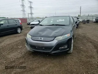 2010 Honda Insight LX with VIN JHMZE2H56AS022299, listed as a Copart auction lot 54872215 with 149,514 mi miles and Salvage title. Bid and sale history available at DreamBid. Image 13.