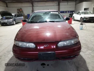2003 Oldsmobile Alero GL1 z VIN 1G3NL52E43C227391, wystawiony jako Copart lot #43970245 z przebiegiem 100 732 mil mil oraz Szkody całkowita. Historia ofert i sprzedaży dostępna na DreamBid. Obrazek 5.