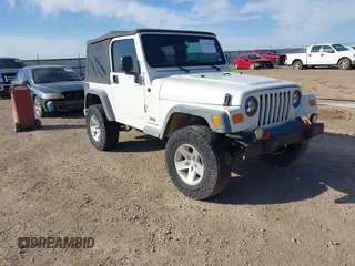 2005 Jeep Wrangler Sport with VIN 1J4FA49SX5P336380, listed as a IAAI auction lot 41752554 with 139,004 mi miles. Bid and sale history available at carsss.com. Image 1.