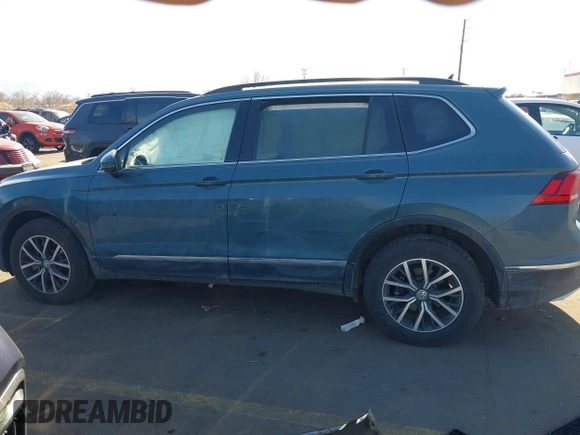2021 Volkswagen Tiguan SE with VIN 3VV2B7AXXMM089913, listed as a IAAI auction lot 41402158 with 68,158 mi miles and . Bid and sale history available at DreamBid. Image 14.