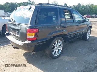 2002 Jeep Grand Cherokee Limited with VIN 1J4GW58N02C176004, listed as a IAAI auction lot 42687339 with 171,545 mi miles and . Bid and sale history available at DreamBid. Image 4.