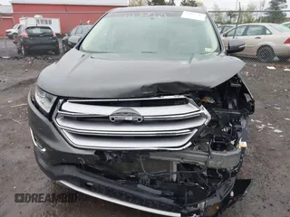 2016 Ford Edge SEL z VIN 2FMPK4J87GBC61845, wystawiony jako IAAI lot #42017547 z przebiegiem 90 710 mil mil oraz . Historia ofert i sprzedaży dostępna na DreamBid. Obrazek 12.
