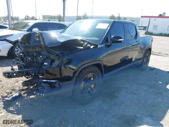 2022 Rivian R1T Launch Edition with VIN 7FCTGAAL1NN010340, listed as a IAAI auction lot 41656762 with 0 mi miles. Bid and sale history available at carsss.com. Image 18.
