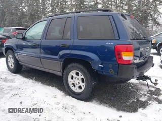 2001 Jeep Grand Cherokee Laredo with VIN 1J4GW48N21C730703, listed as a IAAI auction lot 41581667 with 111,054 mi miles and . Bid and sale history available at DreamBid. Image 3.