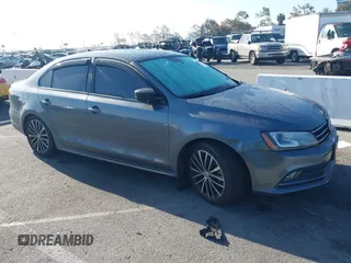 2016 Volkswagen Jetta Sport z VIN 3VWD17AJ0GM386504, wystawiony jako IAAI lot #42000125 z przebiegiem 90 405 mil mil oraz . Historia ofert i sprzedaży dostępna na DreamBid. Obrazek 13.