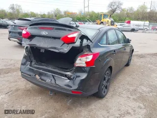2012 Ford Focus Titanium with VIN 1FAHP3J2XCL369554, listed as a IAAI auction lot 42072931 with 95,474 mi miles. Bid and sale history available at carsss.com. Image 13.