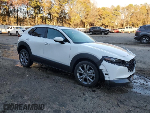 2020 Mazda CX-30 Premium with VIN 3MVDMAEMXLM102106, listed as a Copart auction lot 82964204 with 31,777 mi miles and Salvage title. Bid and sale history available at DreamBid. Image 4.