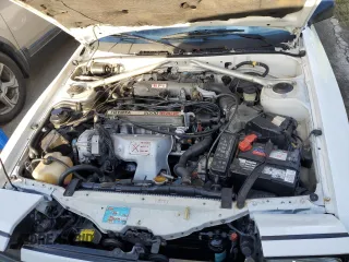1989 Toyota Celica z VIN JT5ST62K8K7343548, wystawiony jako Copart lot #73774594 z przebiegiem 87 477 mil mil oraz Szkoda całkowita • Salvage title. Historia ofert i sprzedaży dostępna na DreamBid. Obrazek 11.