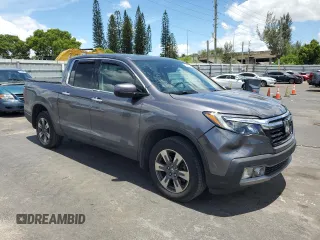 2017 Honda Ridgeline RTL-E with VIN 5FPYK3F74HB027130, listed as a Copart auction lot 60146905 with 99,964 mi miles and Salvage title. Bid and sale history available at DreamBid. Image 4.
