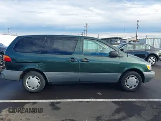 2000 Toyota Sienna CE with VIN 4T3ZF19C6YU220808, listed as a IAAI auction lot 41250496 with 222,812 mi miles. Bid and sale history available at carsss.com. Image 13.