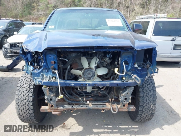 2014 Toyota Tacoma with VIN 3TMLU4EN0EM153558, listed as a IAAI auction lot 41964890 with 140,864 mi miles and . Bid and sale history available at DreamBid. Image 6.