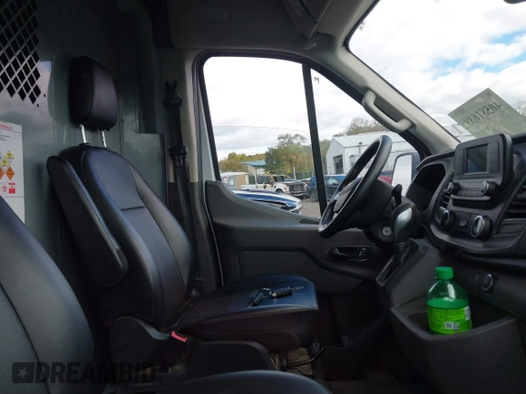 2022 Ford Transit Cargo with VIN 1FTBR3U85NKA64529, listed as a IAAI auction lot 40581639 with 70,680 mi miles and . Bid and sale history available at DreamBid. Image 5.