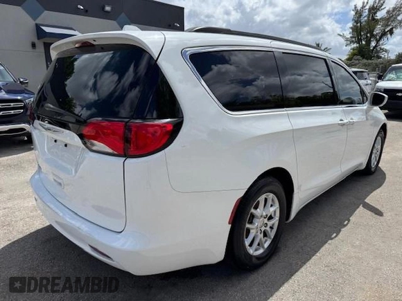 2020 Chrysler Voyager LXI with VIN 2C4RC1DG9LR144605, listed as a Copart auction lot 54107585 with 140,575 mi miles and Salvage Title. Bid and sale history available at carsss.com. Image 3.