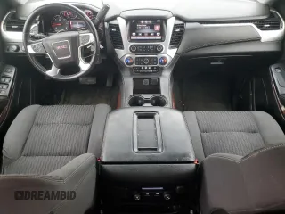 2015 GMC Yukon SLE with VIN 1GKS2AKCXFR107100, listed as a Copart auction lot 47050165 with 135,345 mi miles and Clean Title. Bid and sale history available at carsss.com. Image 8.