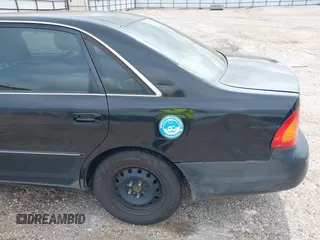 2001 Toyota Avalon XL z VIN 4T1BF28B61U191292, wystawiony jako IAAI lot #42239698 z przebiegiem 288 073 mil mil oraz . Historia ofert i sprzedaży dostępna na DreamBid. Obrazek 6.