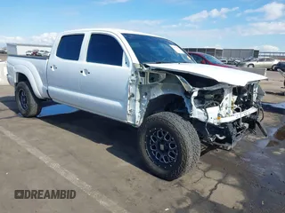2014 Toyota Tacoma with VIN 3TMMU4FN9EM062808, listed as a IAAI auction lot 41450058 with 192,628 mi miles and . Bid and sale history available at DreamBid. Image 1.