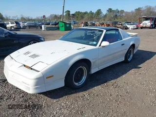 1990 Pontiac Firebird z VIN 1G2FW23F9LL206767, wystawiony jako IAAI lot #42081028 z przebiegiem 64 836 mil mil oraz . Historia ofert i sprzedaży dostępna na DreamBid. Obrazek 2.