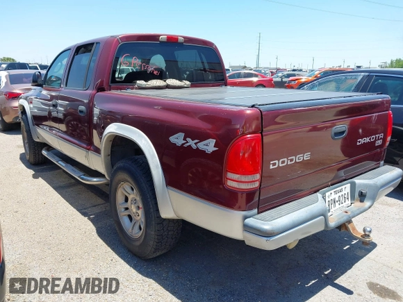 2003 Dodge Dakota SLT with VIN 1D7HG48N43S256520, listed as a IAAI auction lot 42111997 with 218,061 mi miles and . Bid and sale history available at carsss.com. Image 3.