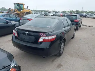 2007 Toyota Camry Hybrid with VIN JTNBB46K873038633, listed as a IAAI auction lot 41927918 with 203,466 mi miles. Bid and sale history available at carsss.com. Image 4.