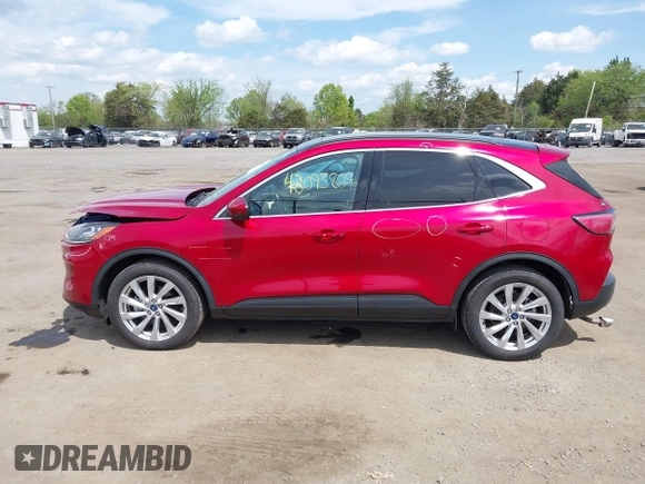2021 Ford Escape Titanium Hybrid with VIN 1FMCU9DZ9MUA15184, listed as a IAAI auction lot 42093809 with 48,983 mi miles and . Bid and sale history available at DreamBid. Image 15.
