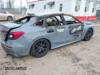 2022 Honda Civic Sport with VIN 2HGFE2F5XNH553141, listed as a IAAI auction lot 41610028 with Not Provided miles and . Bid and sale history available at DreamBid. Image 4.