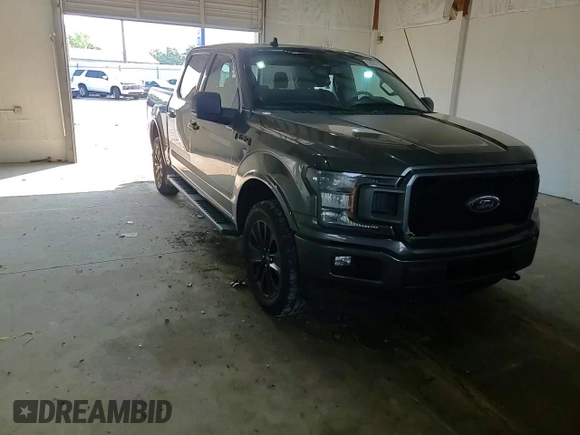 2020 Ford F-150 XL with VIN 1FTEW1E44LFC02735, listed as a Copart auction lot 62062125 with 111,471 mi miles and Salvage title. Bid and sale history available at DreamBid. Image 13.