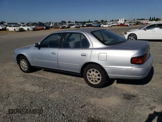 1995 Toyota Camry LE z VIN JT2SK12E1S0317363, wystawiony jako Copart lot #58652095 z przebiegiem 317 577 mil mil oraz Czysty tytuł • Clean title. Historia ofert i sprzedaży dostępna na DreamBid. Obrazek 2.
