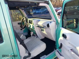 2010 Jeep Wrangler Unlimited Sport with VIN 1J4BA3H15AL166397, listed as a IAAI auction lot 41391376 with 87,091 mi miles. Bid and sale history available at carsss.com. Image 5.