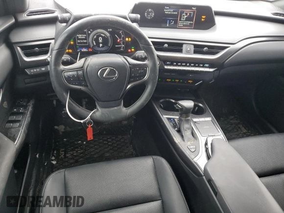 2021 Lexus UX 250h с VIN JTHP9JBH6M2039598, выставлен на аукционе Copart как лот 43122745 с пробегом 66 383 миль миль и Списание • Salvage title. История ставок и продаж доступна на DreamBid. Изображение 8.