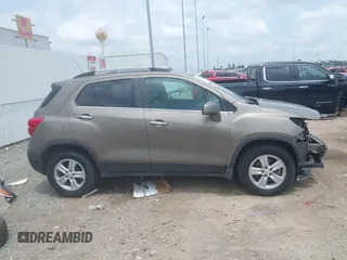 2020 Chevrolet Trax LT with VIN KL7CJLSB7LB351195, listed as a IAAI auction lot 42266365 with 64,257 mi miles and . Bid and sale history available at DreamBid. Image 14.