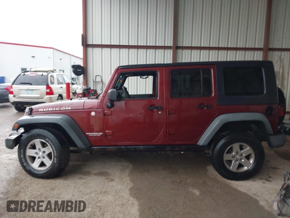 2010 Jeep Wrangler Unlimited Rubicon z VIN 1J4HA6H18AL180628, wystawiony jako IAAI lot #42110357 z przebiegiem 217 940 mil mil oraz . Historia ofert i sprzedaży dostępna na DreamBid. Obrazek 14.
