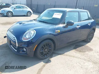 2015 MINI Hardtop 4 Door with VIN WMWXS5C50FT830060, listed as a IAAI auction lot 42744826 with 99,813 mi miles and . Bid and sale history available at DreamBid. Image 2.