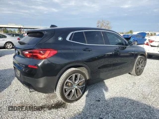 2019 BMW X2 sDrive28i with VIN WBXYJ3C56K5N36579, listed as a Copart auction lot 88320995 with 66,143 mi miles and Salvage Title. Bid and sale history available at carsss.com. Image 3.