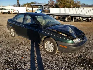 1997 Saturn SL z VIN 1G8ZH5285VZ122690, wystawiony jako Copart lot #81655244 z przebiegiem 159 048 mil mil oraz Szkoda całkowita • Salvage title. Historia ofert i sprzedaży dostępna na DreamBid. Obrazek 11.