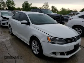 2014 Volkswagen Jetta TDI w/Premium with VIN 3VWLL7AJ2EM410482, listed as a Copart auction lot 53691984 with 77,421 mi miles and Salvage title. Bid and sale history available at DreamBid. Image 4.