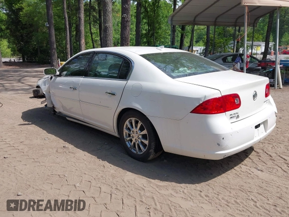 2009 Buick Lucerne CXL with VIN 1G4HD57M79U135698, listed as a IAAI auction lot 42165966 with 131,615 mi miles. Bid and sale history available at carsss.com. Image 3.