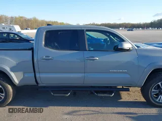 2018 Toyota Tacoma SR5 with VIN 3TMDZ5BN3JM054548, listed as a IAAI auction lot 42038480 with 122,242 mi miles and . Bid and sale history available at DreamBid. Image 13.