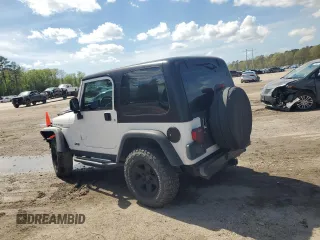 2003 Jeep Wrangler Rubicon z VIN 1J4FA69S73P333199, wystawiony jako Copart lot #50602615 z przebiegiem 133 254 mil mil oraz Szkoda całkowita • Salvage title. Historia ofert i sprzedaży dostępna na DreamBid. Obrazek 2.