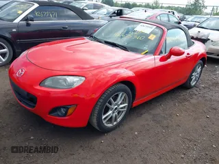 2011 Mazda MX-5 Miata Sport z VIN JM1NC2JF7B0218824, wystawiony jako IAAI lot #42675310 z przebiegiem 137 493 mil mil oraz . Historia ofert i sprzedaży dostępna na DreamBid. Obrazek 17.